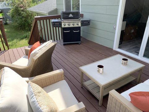 Fire up the grill with mature trees all around and the kitchen steps away