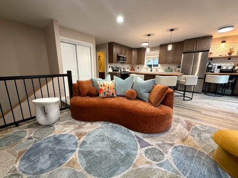 Cook, chat and keep everyone together: the kitchen is open to the living room