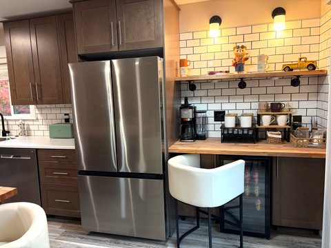 Mornings start here: a fully stocked coffee and tea bar with a beverage fridge