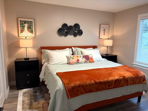 Upstairs king: luxury bedding on a brand new mattress, made fresh for every stay