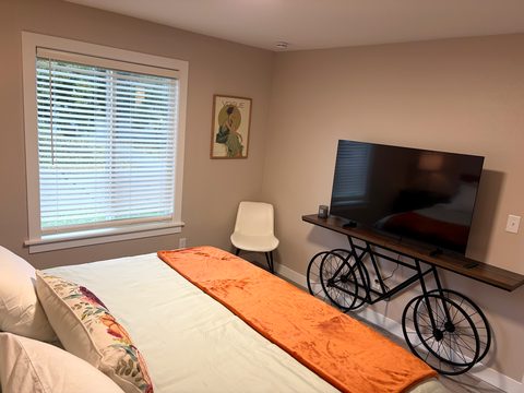 Your own 55-inch TV in the king bedroom, for a slow morning or a late night