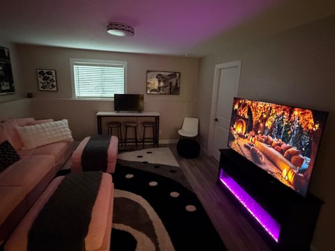 Settle in for a movie on the 65-inch screen, with room for the whole group
