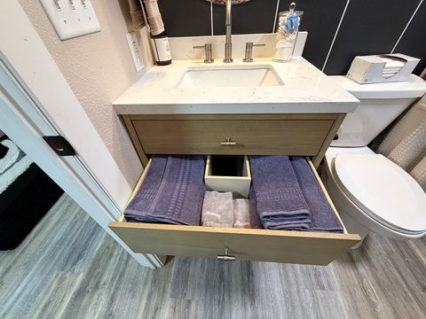 Towels folded and waiting in the vanity drawer for the minute you arrive