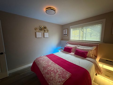 Nightstands with built-in USB charging on both sides of the bed
