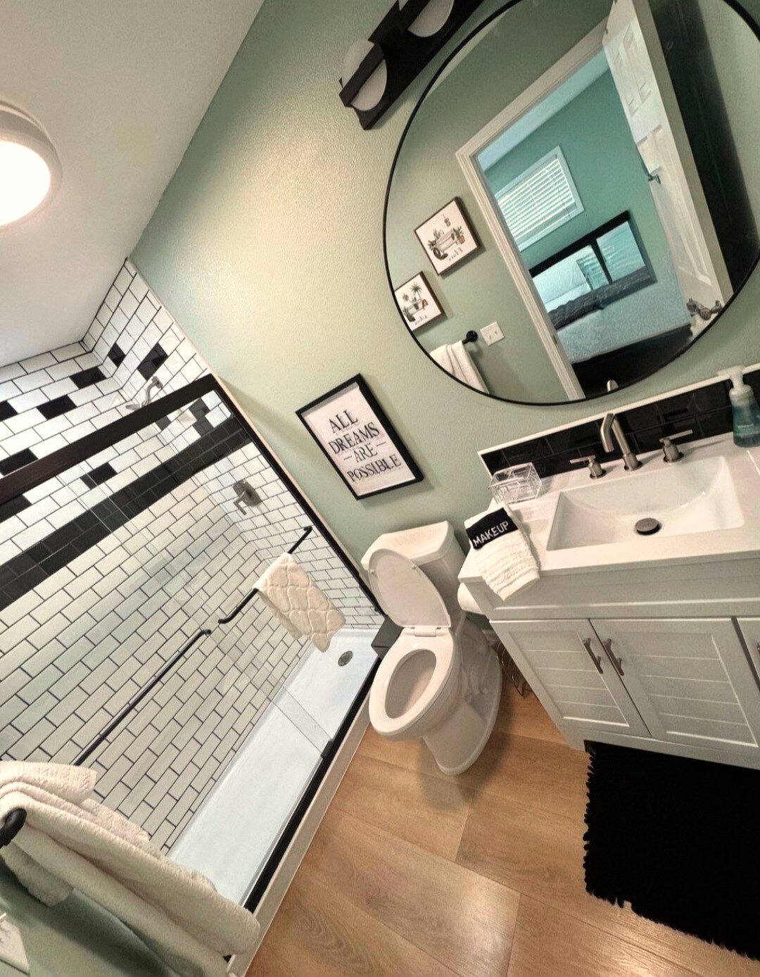 Full bathroom with subway tile shower