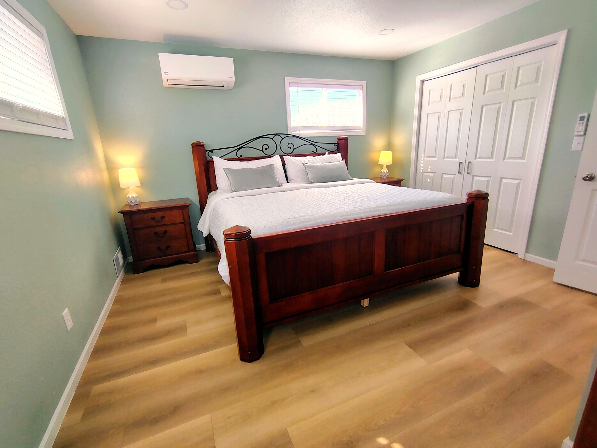 King bedroom, traditional styling, Pretty in Pink Bismarck short-term rental
